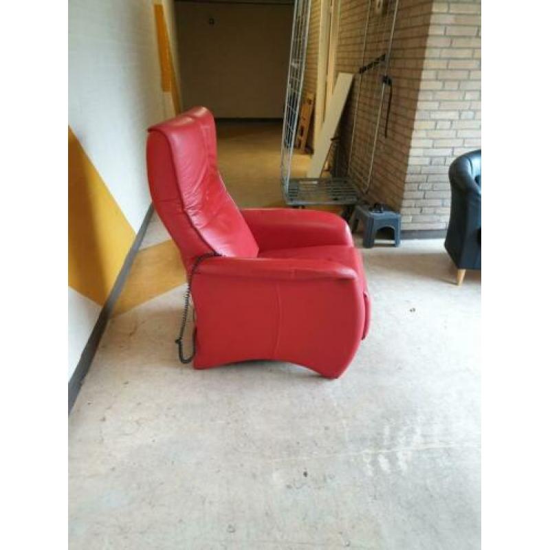 Prominent sta op fauteuil